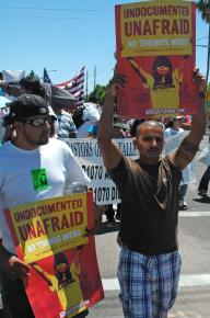 At least 50,000 people took to the streets of Phoenix for a day of action against SB 1070